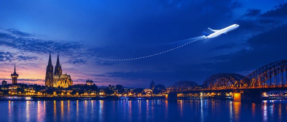 Cologne skyline at night with the cathedral and Hohenzollern bridge